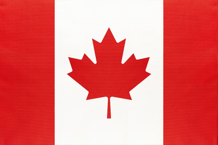 Foto bandiera del tessuto nazionale del canada, simbolo del mondo internazionale del paese del nord america.