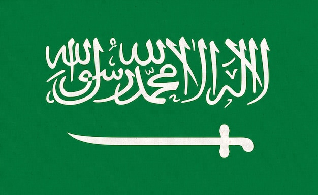 Bandiera dell'Arabia Saudita Bandiera saudita sulla superficie del tessuto Testo del tessuto