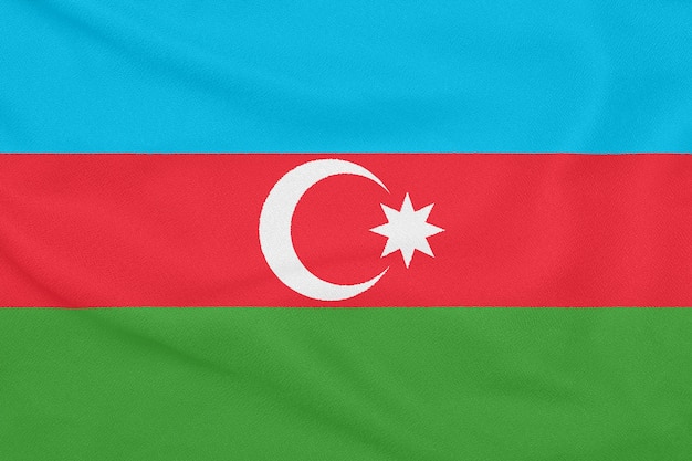 Bandiera dell'Azerbaigian su tessuto strutturato. Simbolo patriottico