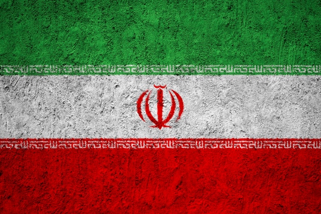 Bandiera dell&#39;Iran dipinta sulla parete del grunge