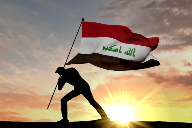 Bandiera dell'Iraq che viene spinta nel terreno da un rendering 3D di silhouette maschile