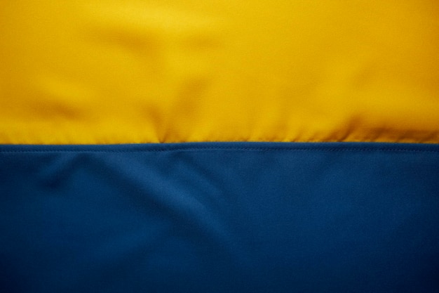 Bandiera dell'Ucraina con la trama del tessuto. Bandiera nazionale della priorità bassa del tessuto dell'Ucraina. bandiera dell'Ucraina.