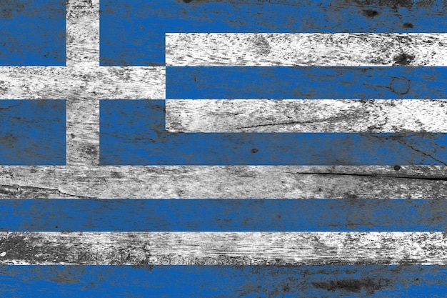 Bandiera della Grecia dipinta su un vecchio fondo di legno danneggiato