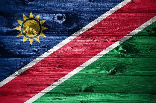 Bandiera della Namibia sulla bandiera di legno del fondo delle assi di legno