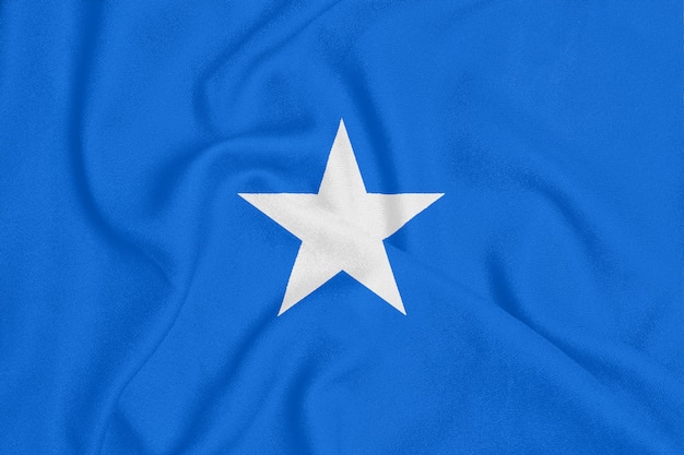 Bandiera della Somalia su tessuto strutturato. Simbolo patriottico