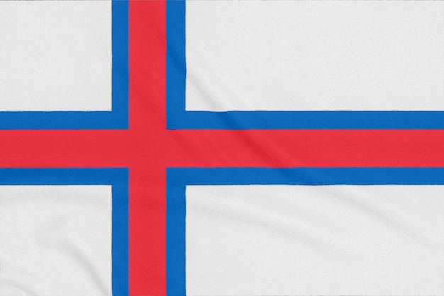 Bandiera delle Isole Fær Øer su tessuto strutturato. Simbolo patriottico
