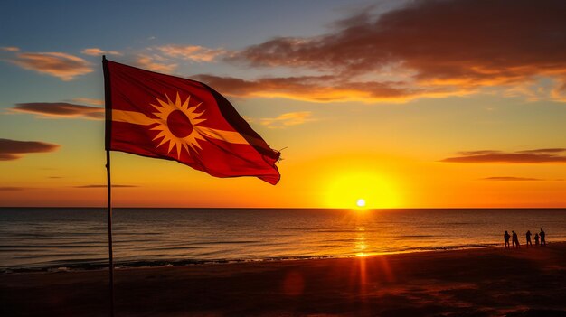 bandiera lusinghiera davanti al tramonto