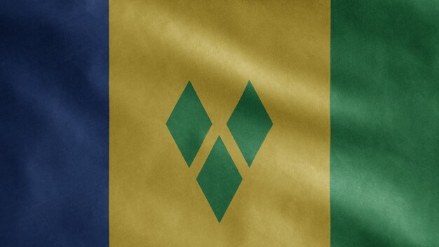 Bandiera vincenziana che sventola nel vento. Stendardo di Saint Vincent e Grenadine che soffia in morbida seta