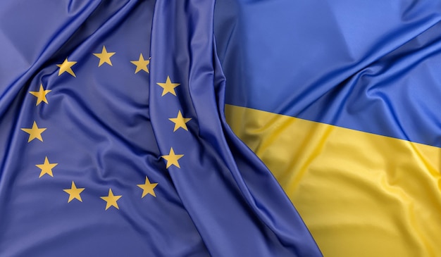 Bandiere arruffate dell'Unione europea e dell'Ucraina 3D Rendering
