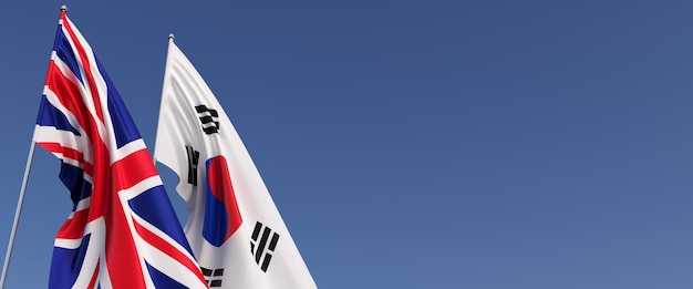 Bandiere del Regno Unito e della Corea del Sud sui pennoni sul lato Bandiere su sfondo blu Gran Bretagna Inghilterra Seoul Asia 3D illustrazione