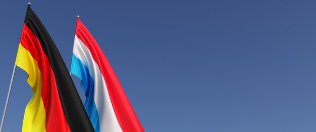 Bandiere della Germania e del Lussemburgo sui pennoni sul lato Bandiere su sfondo blu Posto per il testo Berlino Monaco Principato Commonwealth 3D illustrazione