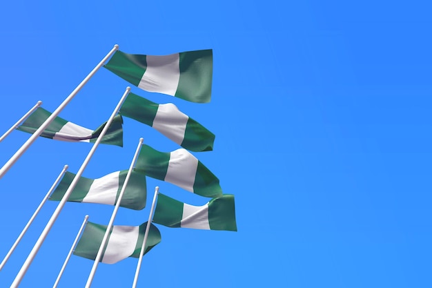 Bandiere della Nigeria che sventolano nel vento contro un cielo blu d rendering