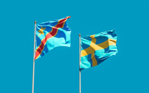 Bandiere della Svezia e della Repubblica Democratica del Congo sullo sfondo del cielo