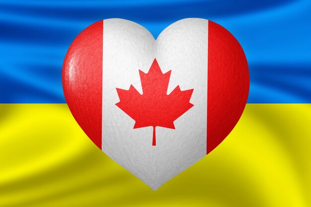 Bandiere di Ucraina e Canada Colore del cuore della bandiera sullo sfondo della bandiera dell'Ucraina