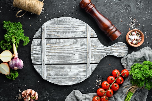 Banner di cucina Verdure e spezie su sfondo nero Spazio libero per il testo Stile rustico