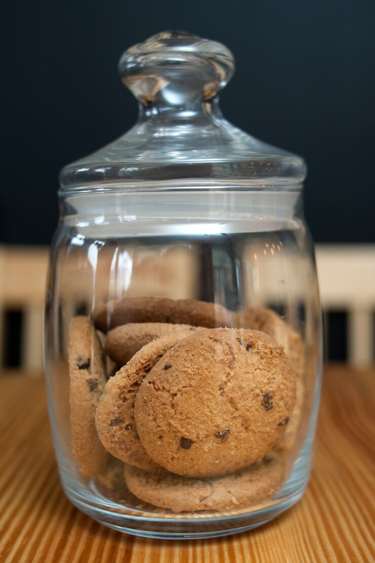 Foto barattolo di biscotti con gocce di cioccolato per pasticceria alimentare snack dolce