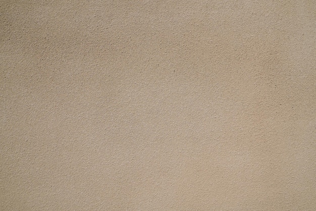 Beige muro di cemento superficie texture di sfondo intonaco marrone chiaro sabbia colore