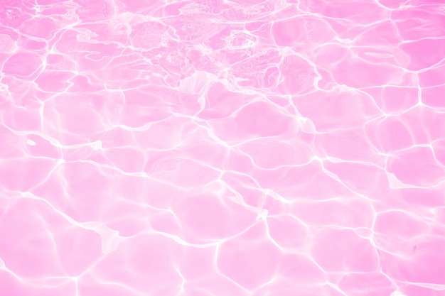 Bella acqua rosa nel fondo di struttura della piscina