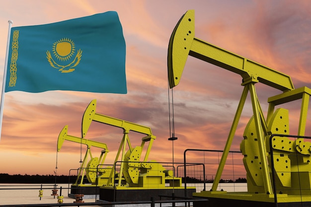 Bella estrazione di olio di pumpjack e cielo nuvoloso al tramonto con la bandiera del Kazakistan.
