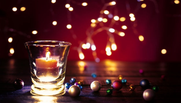 Bella luce festiva della candela Fondo di concetto di Buon Natale.