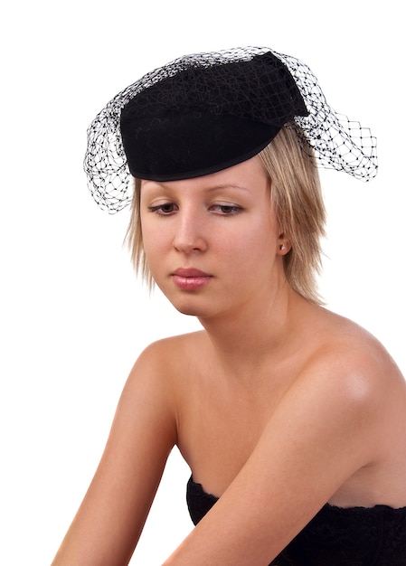 Bella ragazza con cappello, isolata su bianco