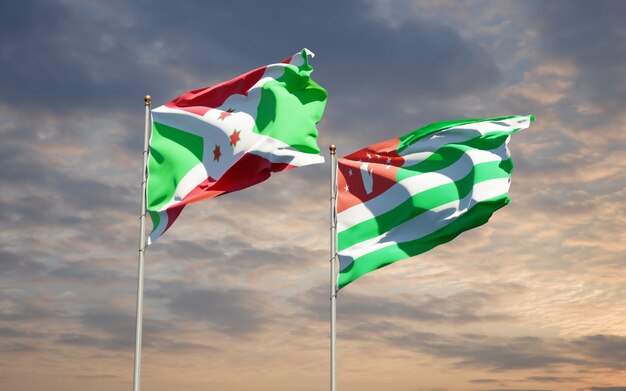 Belle bandiere di stato nazionali dell'Abkhazia e del Burundi insieme