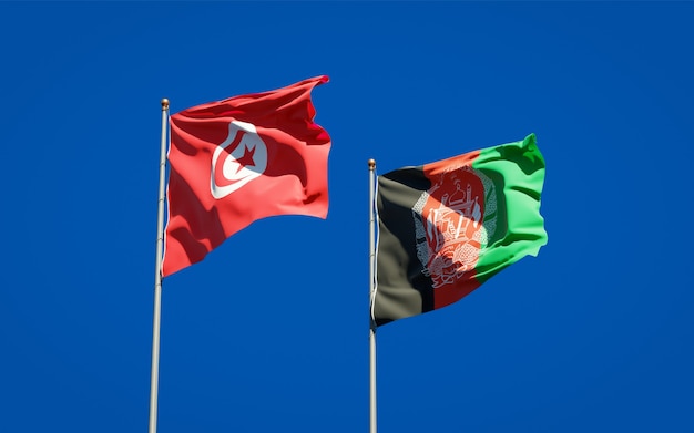 Belle bandiere di stato nazionali dell'Afghanistan e della Tunisia