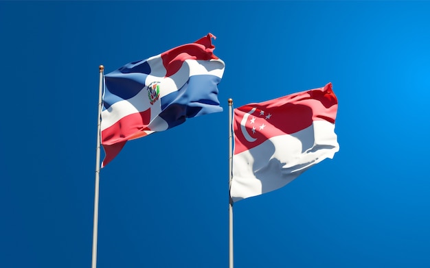 Belle bandiere di stato nazionali di Singapore e Repubblica Dominicana