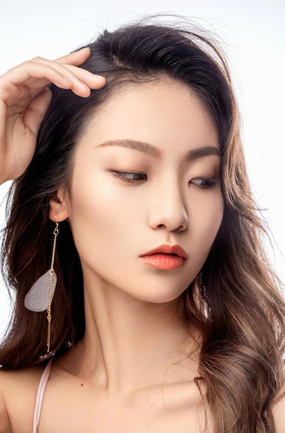Belle donne asiatiche Trattamenti naturali per il viso e caratteristiche del viso femminile