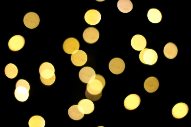 Bellissimo bokeh giallo di Natale e Capodanno