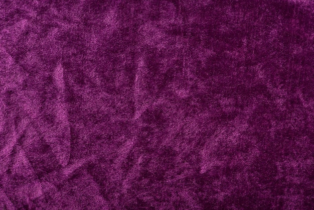 Bellissimo sfondo in raso di seta viola pieghe morbide su un tessuto lucido compleanno natale san valentino da