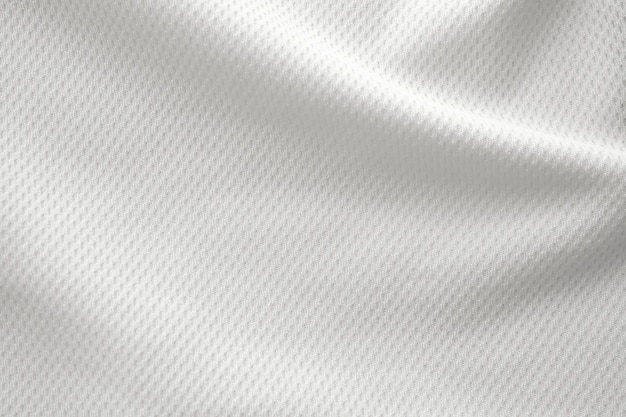 Bianco abbigliamento sportivo tessuto jersey maglia da calcio texture vista dall'alto da vicino