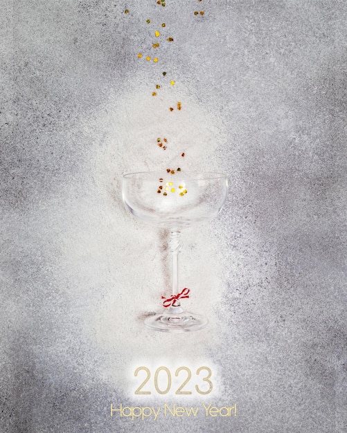 Bicchiere di champagne e iscrizione 2022 felice anno nuovo