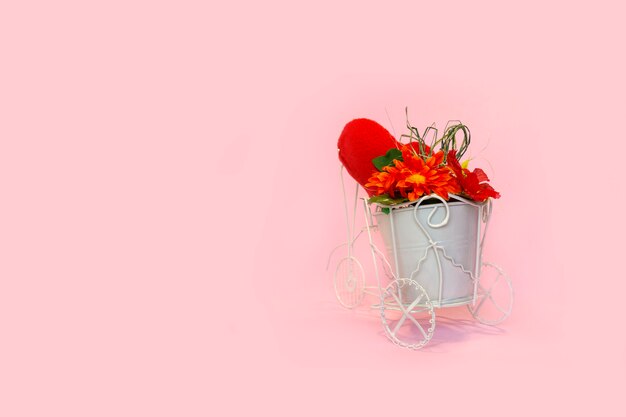 Bicicletta retrò con vaso di fiori bouquet