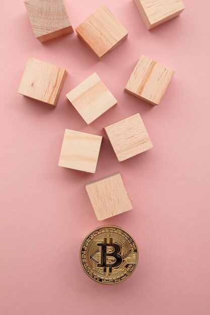 Bitcoin criptovaluta moneta blockchain concetto di tecnologia moneta con blocco di legno