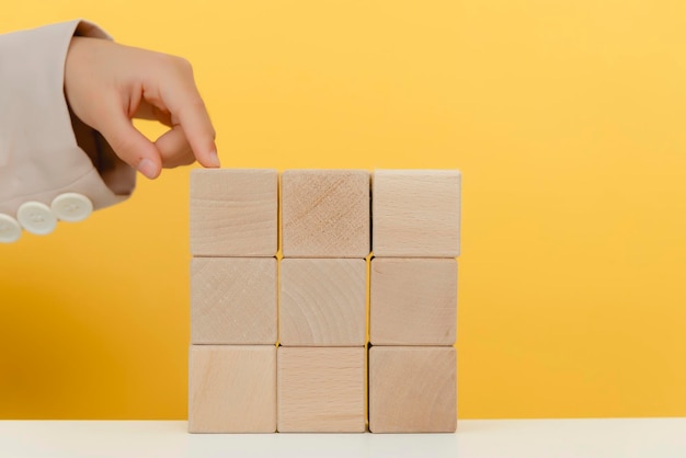 Blocchi di legno che aumentano la barra grafica