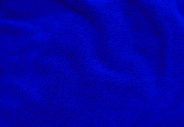 Blu lana pulita texture sfondo luce naturale lana di pecora blu cotone senza cuciture texture di soffice pelliccia per designer primo piano frammento blu lana tappeto