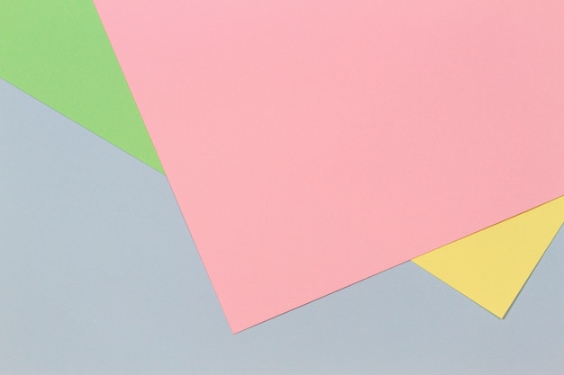 Blu rosa giallo verde pastello carta di colore piatto geometrico laici sfondo