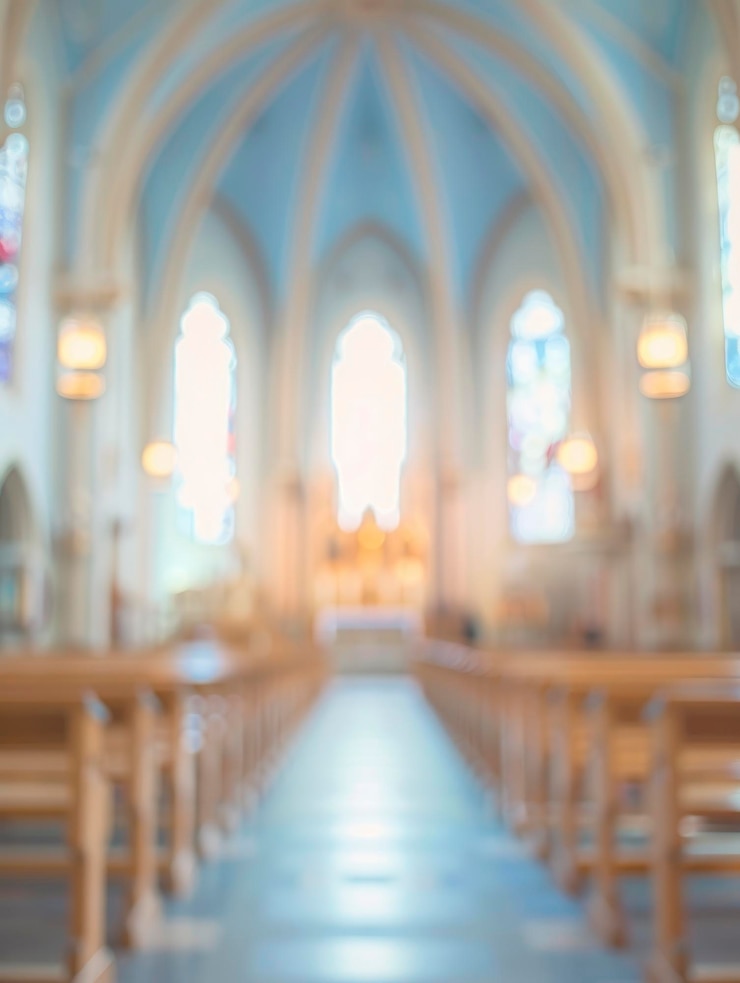 Blurred Catholic church interior with no people classical interior light colors background