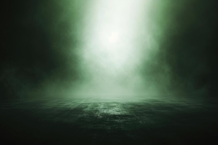 Blurred white and green gradient with glowing light spot