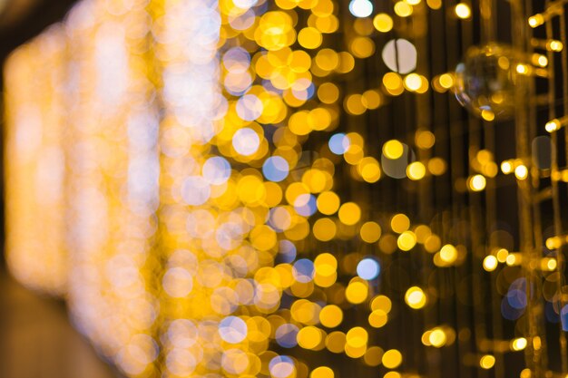 Bokeh circolare astratto di luce colorata di Natale e felice anno nuovo sfondo.