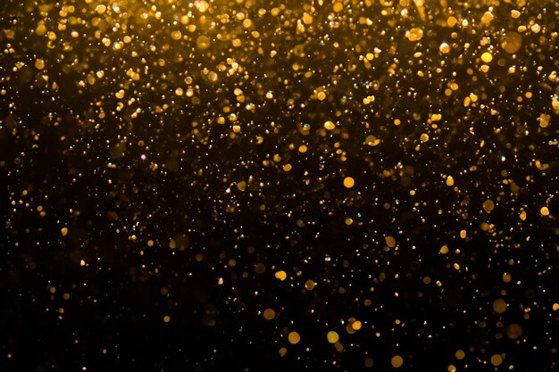 Bokeh d'oro astratto con nero