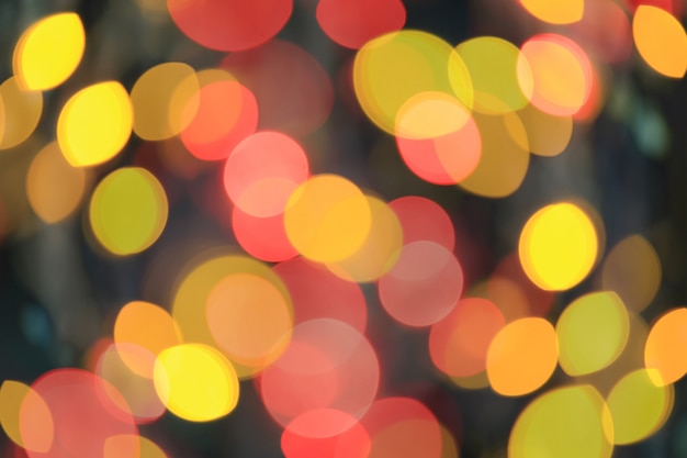 Bokeh variopinto astratto della priorità bassa di natale.