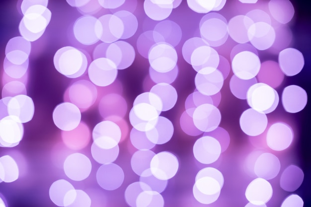 Bokeh viola sfocato sfondo di luci