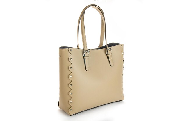 Borsa in pelle beige isolata su sfondo bianco Borsa a mano minimalista