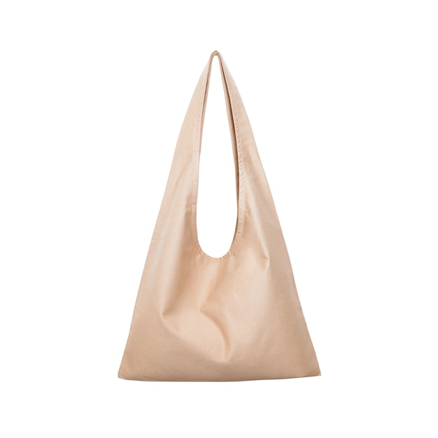 Borsa per la spesa in tessuto beige su superficie bianca isolata posto per il tuo design concetto di protezione ambientale zero rifiuti informati acquistando il tessuto in tela per modello vuoto mockup