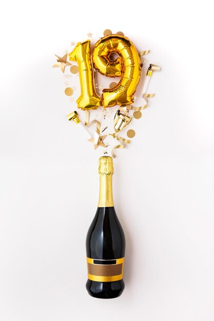 Bottiglia di champagne per feste di buon anniversario con palloncino con numero d'oro