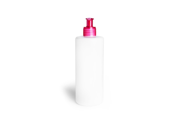 Bottiglia di plastica della pompa con erogatore rosa per sapone liquido o gel isolato su bianco.