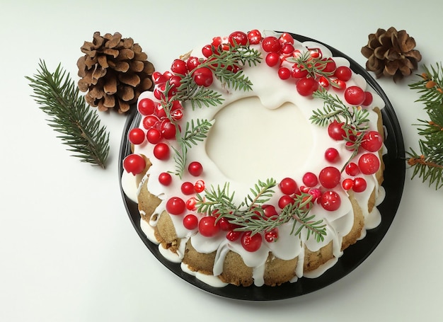 Budino di torta di Natale con candele rosse