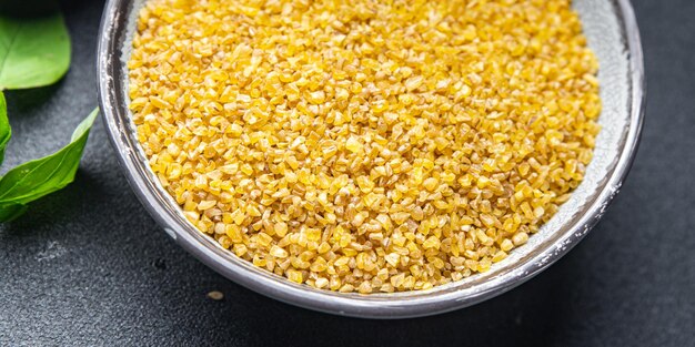 bulgur raccolto di grano crudo cibo a base vegetale cibo sano spuntino dieta sul tavolo copia spazio cibo